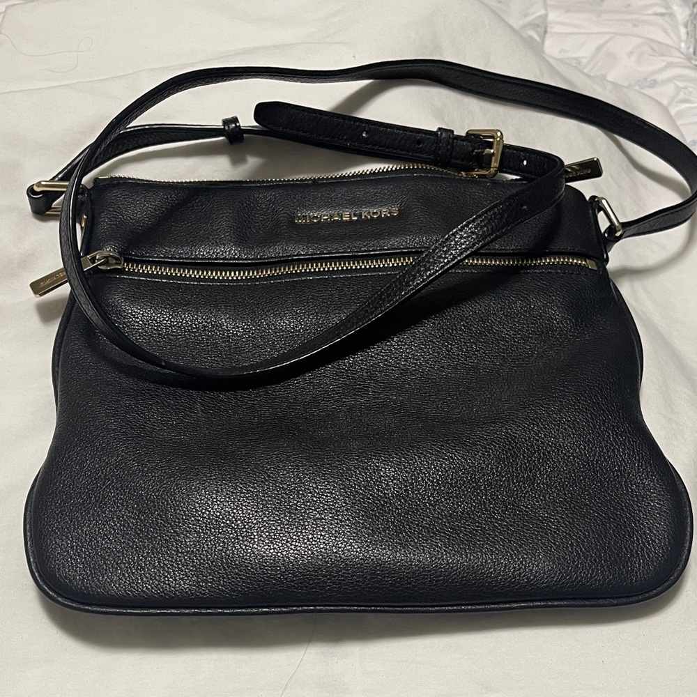 Michael Kors Elegant Black Crossbody Bag with Gold Details